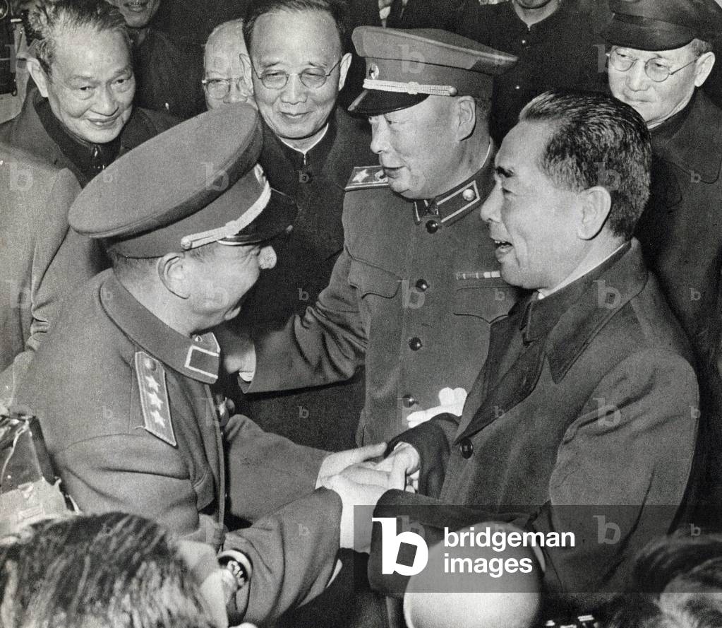 Zhou Enlai (or Chou En-Lai (En Lai) or Cheou Ngen-Lai (Ngen lai) or Chu En Lai) (1898-1976) visiting the army troops with Chen Yi (1901-1972), Deputy Prime Minister of the People's Republic of China. Photography, in “The Life of Zhou En Lai”, Shanghai, 1977.