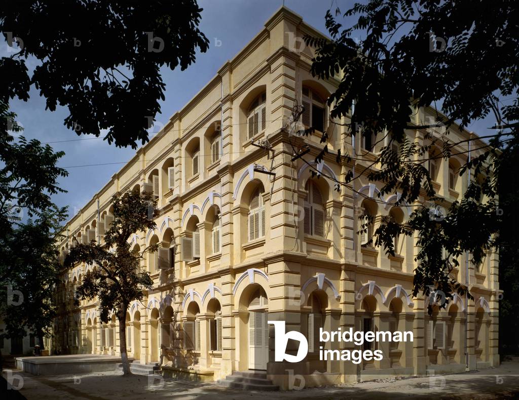 Colonial architecture in Vietnam: Facade of Puginier School, Christian school founded by Monsignor Puginier, built in 1898, military style architecture.