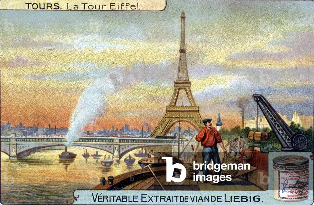 The Eiffel Tower seen from the Seine in Paris in the evening.