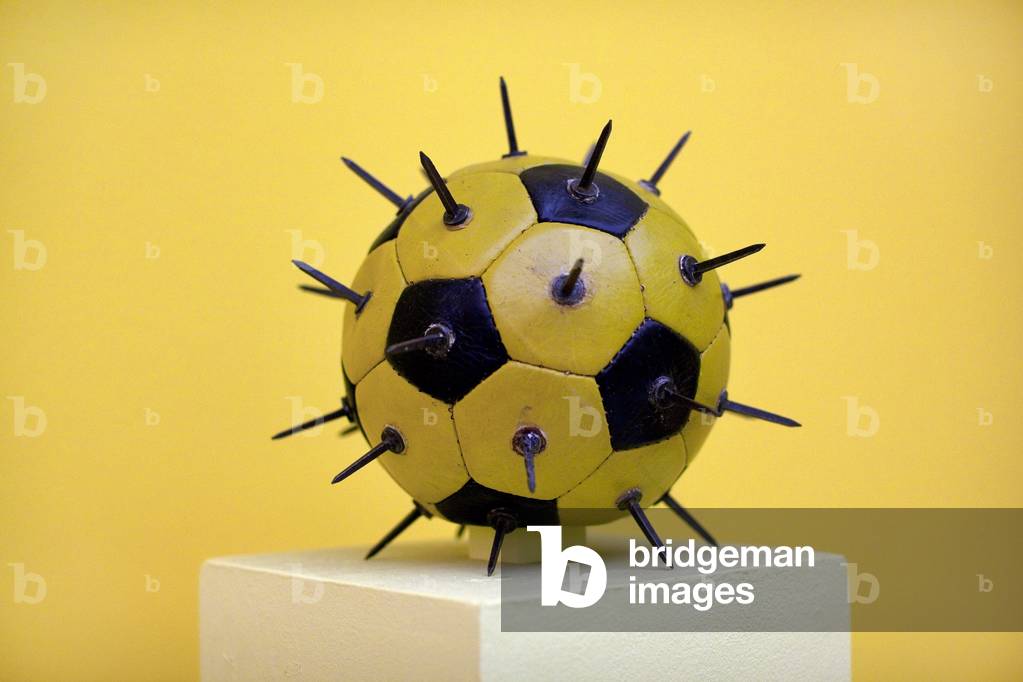 Soccer with studs. Artwork by Bohumil Stepan (1913-1985), leather and metal object, 1968-1969. Czech art, 20th century. Veletrzni Palace (Fairgrounds), Prague (Czech Republic).