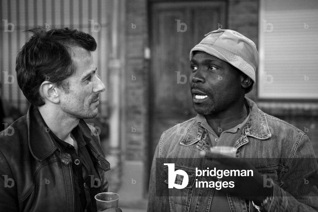 Vincent Bizien, French cartoonist, Malam, Cameroonian sculptor. Opening of the exhibition Cristine Guinamand. Galerie Trafic in Paris on September 5, 2003.