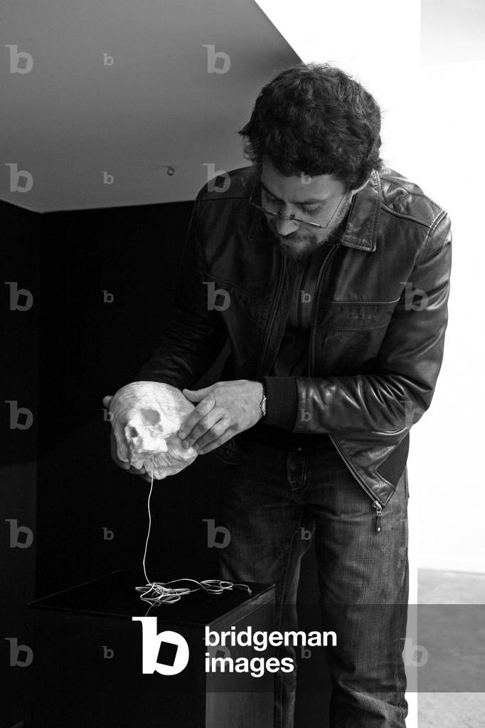 Portrait of Youcef Korichi, French painter. Youcef Korichi exhibition in the gallery Traffic in Paris in 2009.