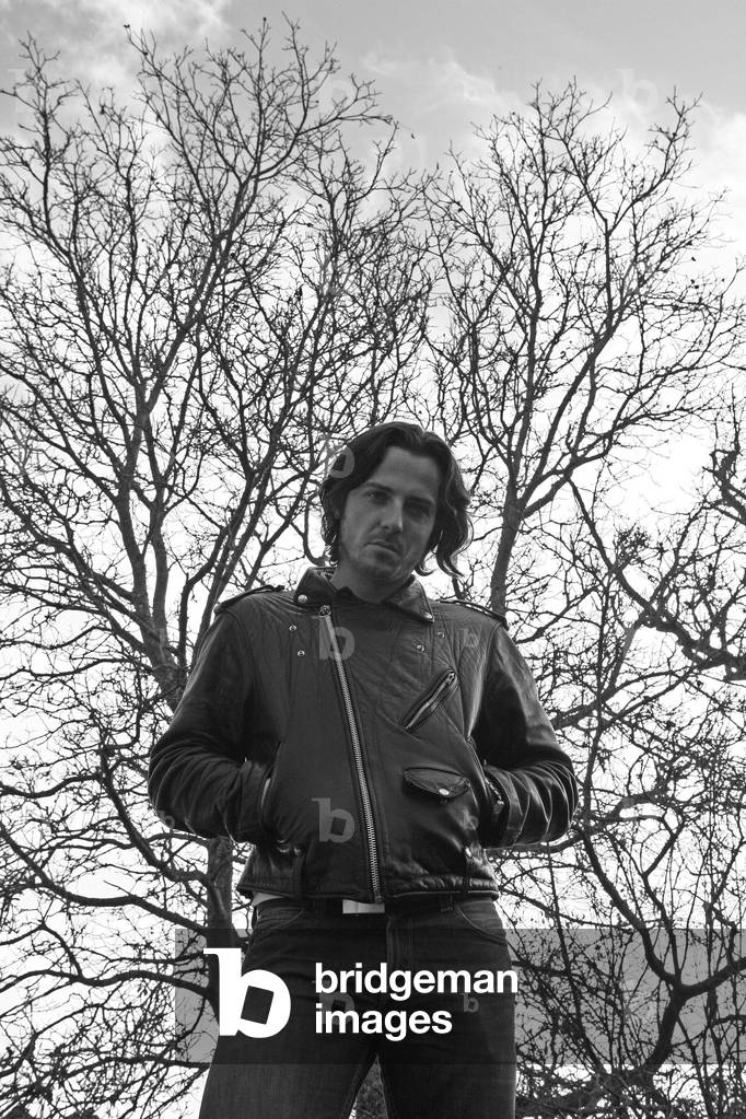 Portrait of Pascal Pillard, French painter, in the courtyard of his house in Ymeray in 2007.