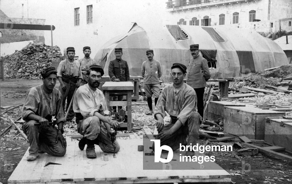 France: In a barracks, carpenters repair a barracks, 1910