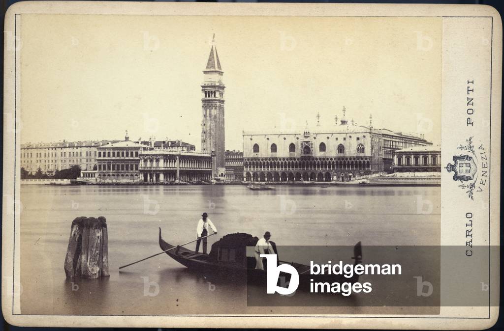 Venetie, Venice: A gondola with two gondoliers on the lagoon of Venice, 1885