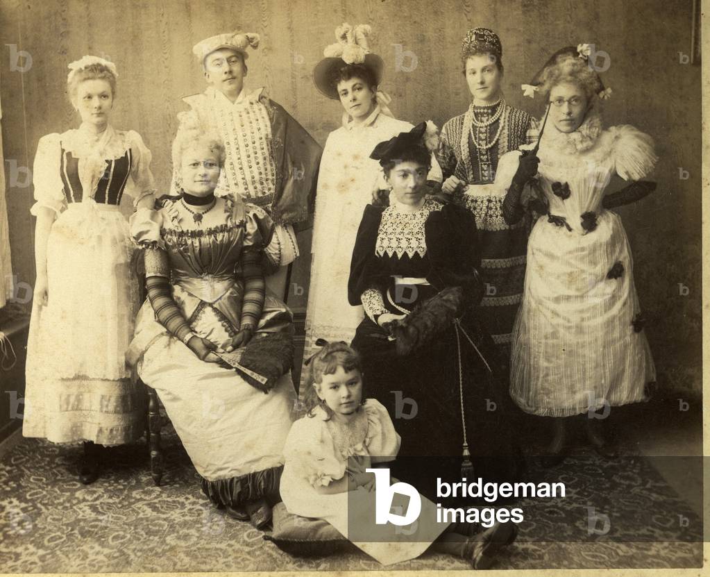 France: Photo of a group participating in a costume ball, 1880