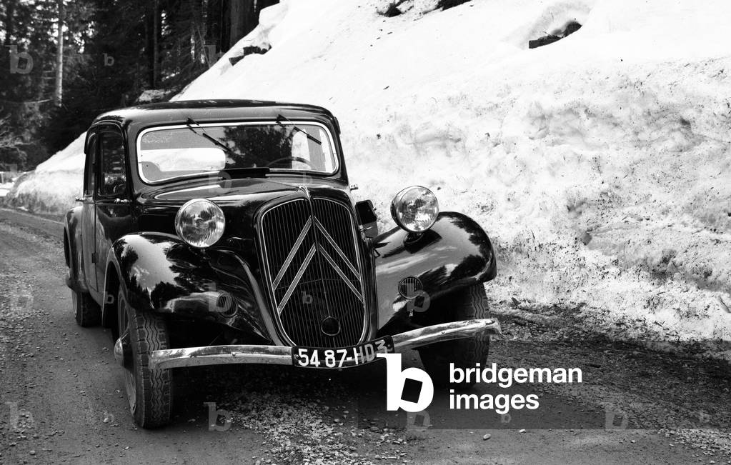 France: light Citroen car BL front-wheel drive on a snow-covered mountain road, 1947 - registration: 5497-HD37