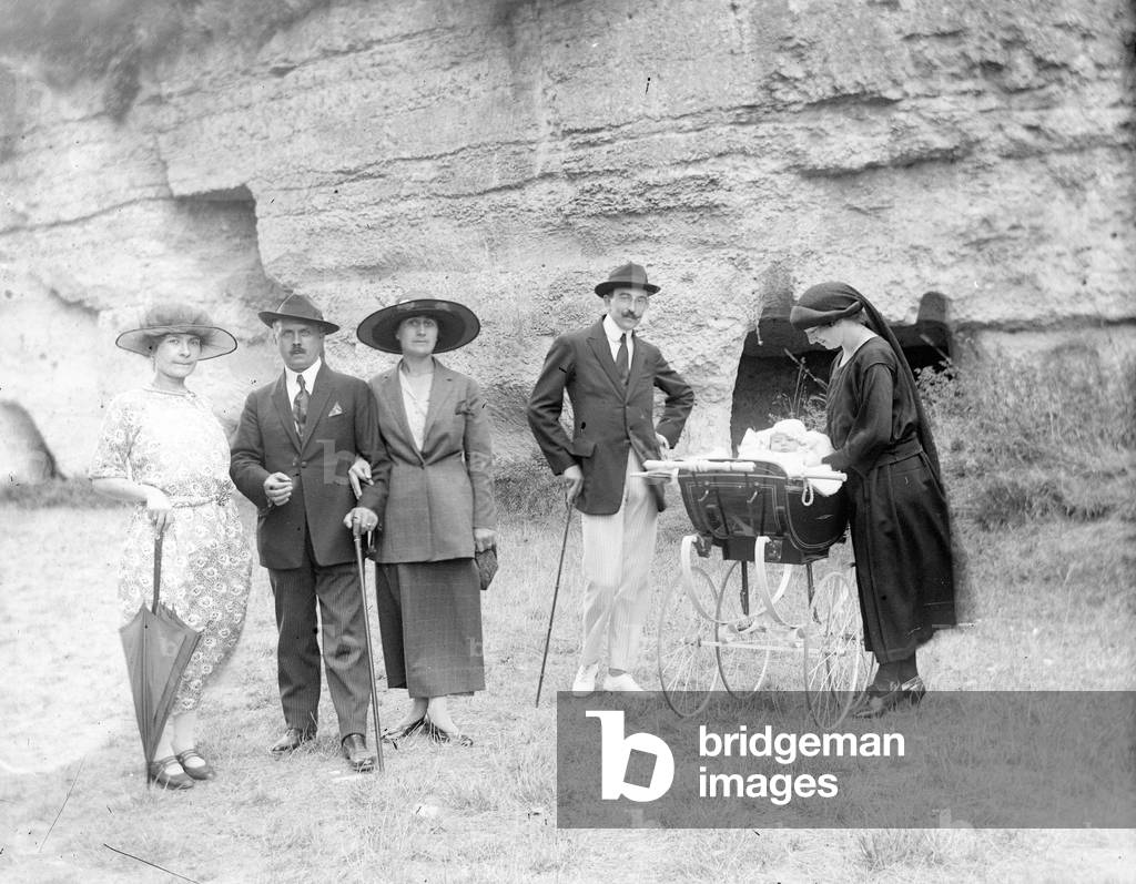 France, Lower Normandy: A family walks on the Normandy coast at the bottom of the cliff, 1902