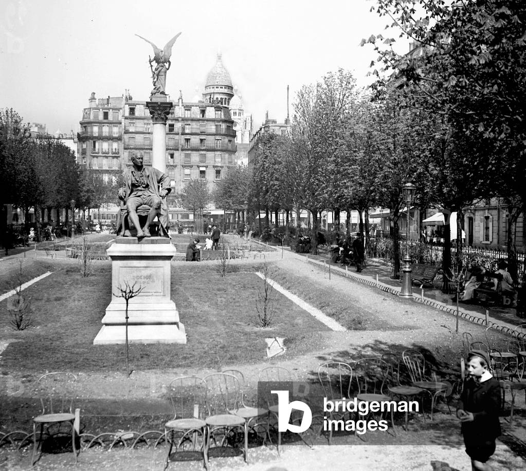 France, Ile-de-France, Paris (75): square place Clichy, statue of Diderot at the foot of Montmartre and the basilica under construction, 1888