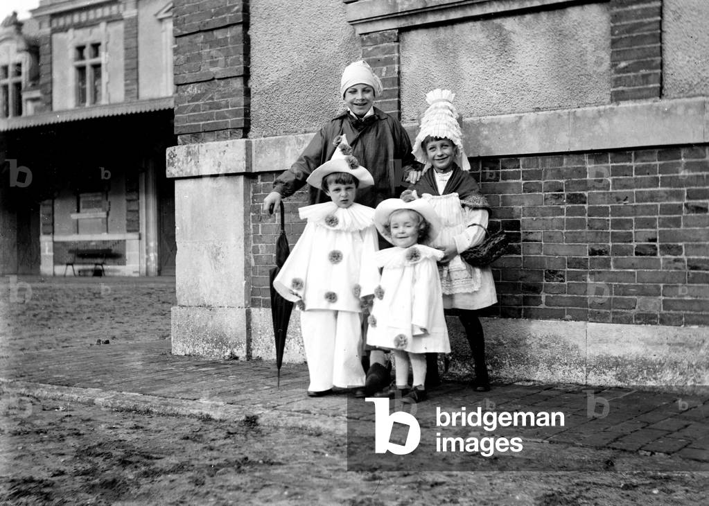 France: four children in Meunier and Pierrot, 1900