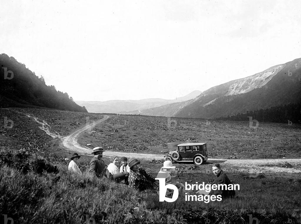 France: mountain walk of a group, with car park on a hiking path, 1925