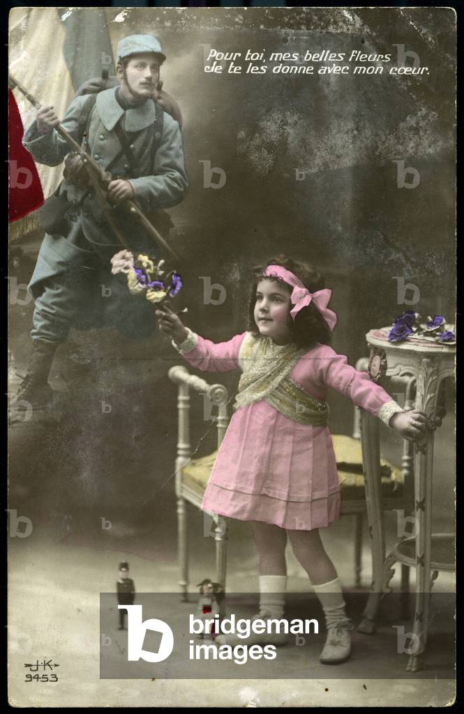 First World War: France, A little girl thinks of her father holding a French flag and playing with an Alsatian doll, 1915