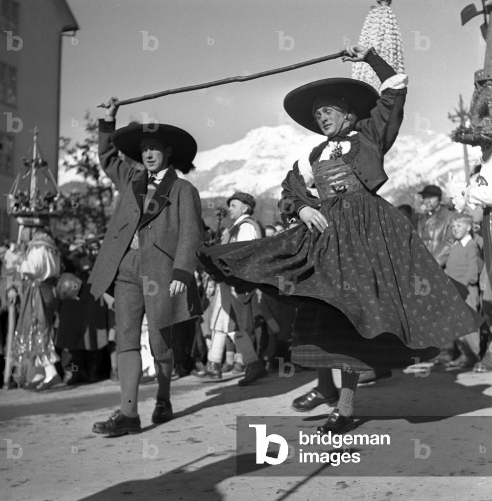 Innsbruck: A couple performs traditional dance, 1937