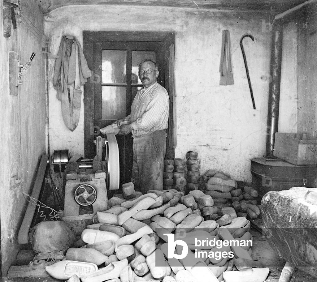 France, Pays de la Loire, Vendee (85), Les Sables-d'Olonnes: a sabotier in his workshop making hooves, 1935