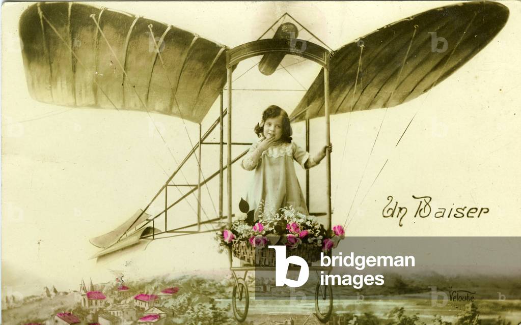 France: Fancy postcard showing a child in a fantasy plane, 1905