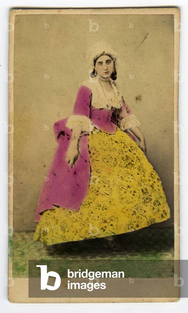 France, Portrait of a young girl in a studio in a traditional dress and headdress, 1865