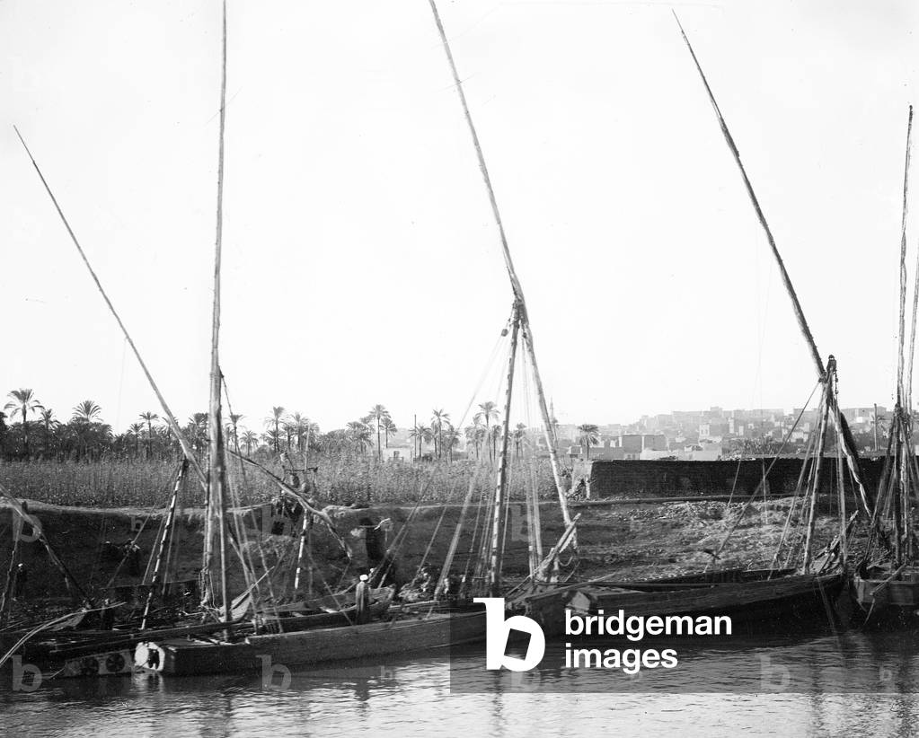 Egypt: Cook cruise, bank of the Nile in the suburbs of Cairo, with felouques at the pier, 1900