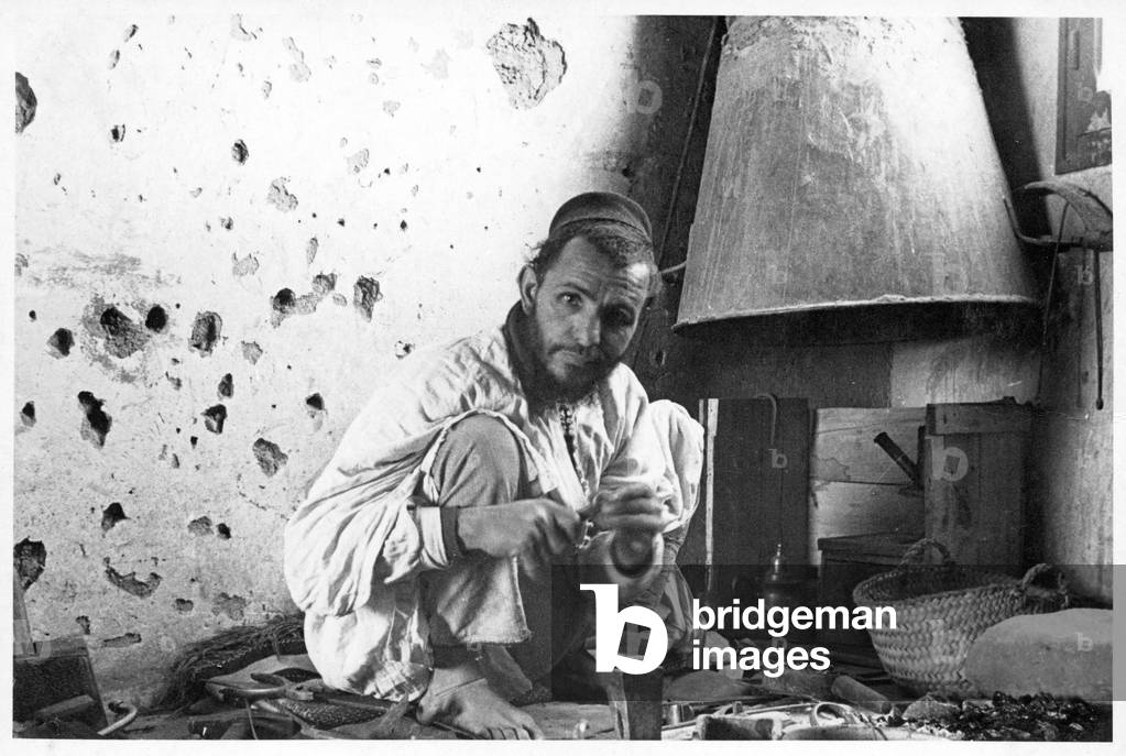 Ouarzazat, Morocco: A tingler at work, 1935