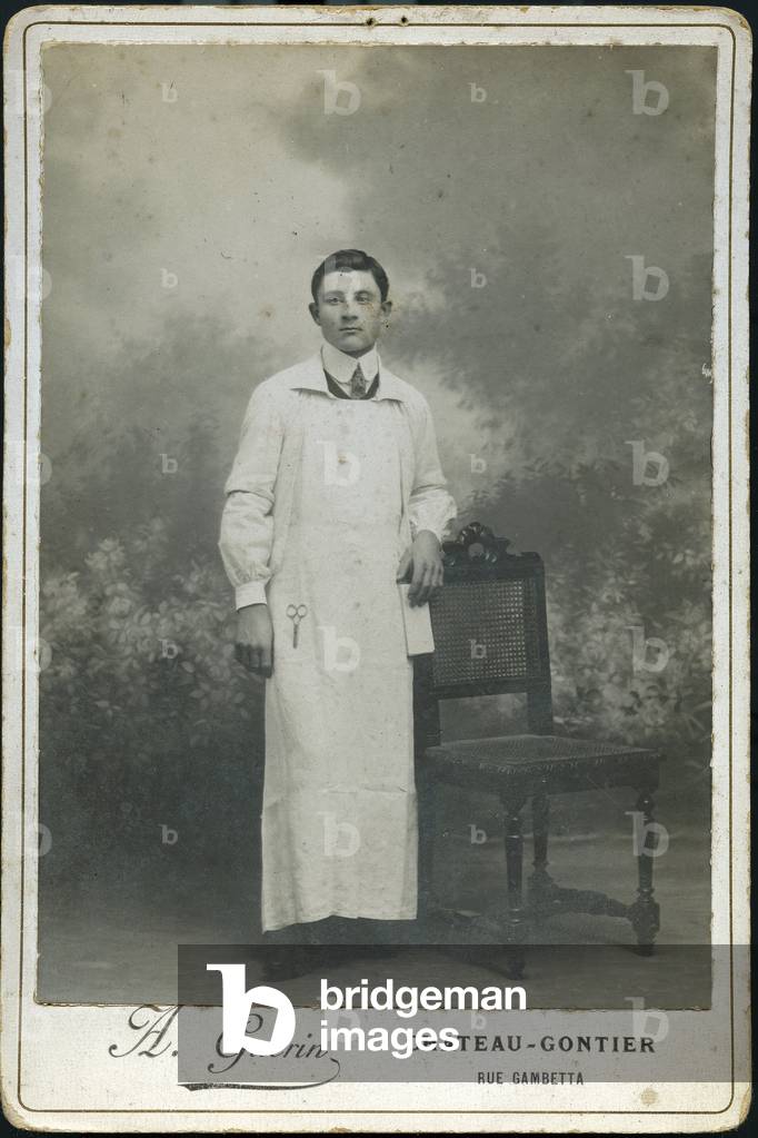 France, Pays de la Loire, Mayenne (53), Chateau-Gontier: a young nurse (panseur) pose in studio, 1890