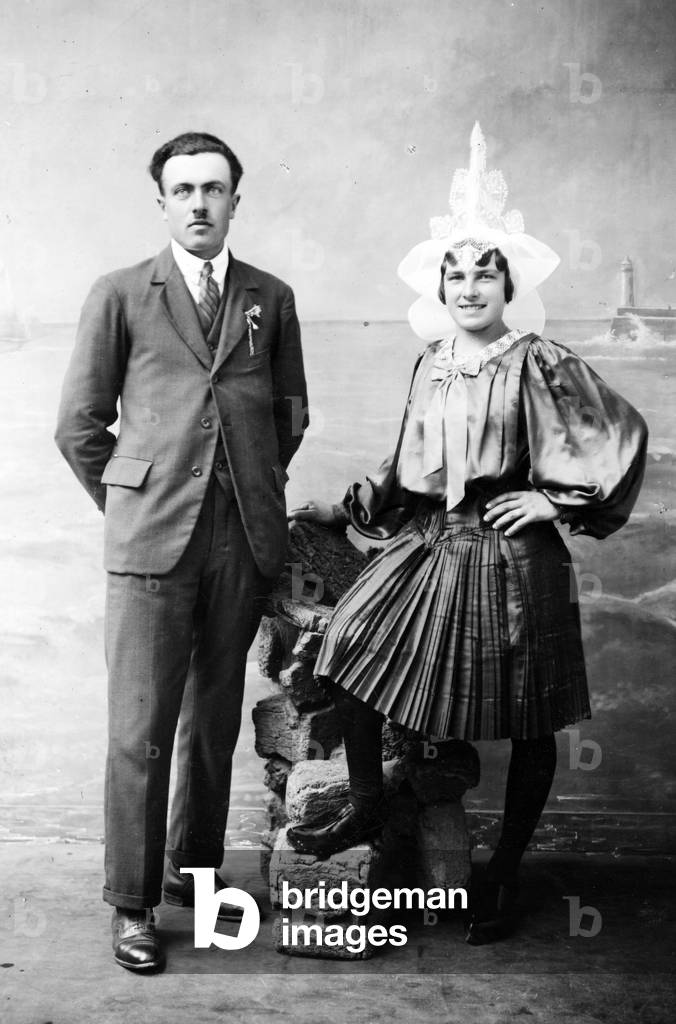 France, Pays de la Loire, Vendee (85), Les Sables-d'Olonne (Sables d'Olonne): a couple in studio whose wife is deguised in Sablaise, 1930