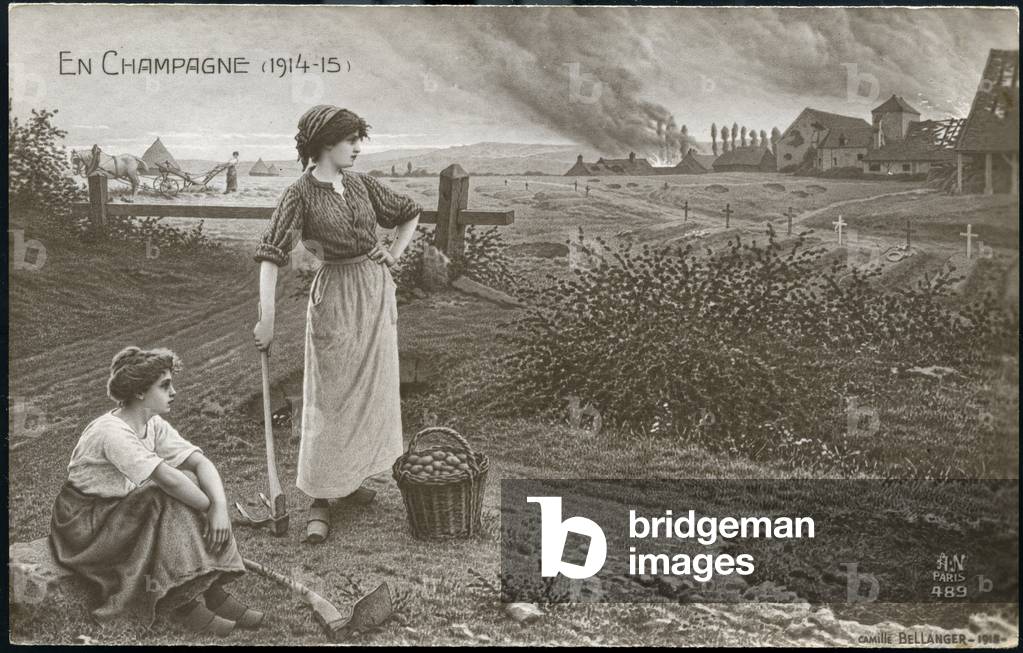 First World War: France, Near a burning village of Lorraine, a woman plows and two women collect potatoes, 1915
