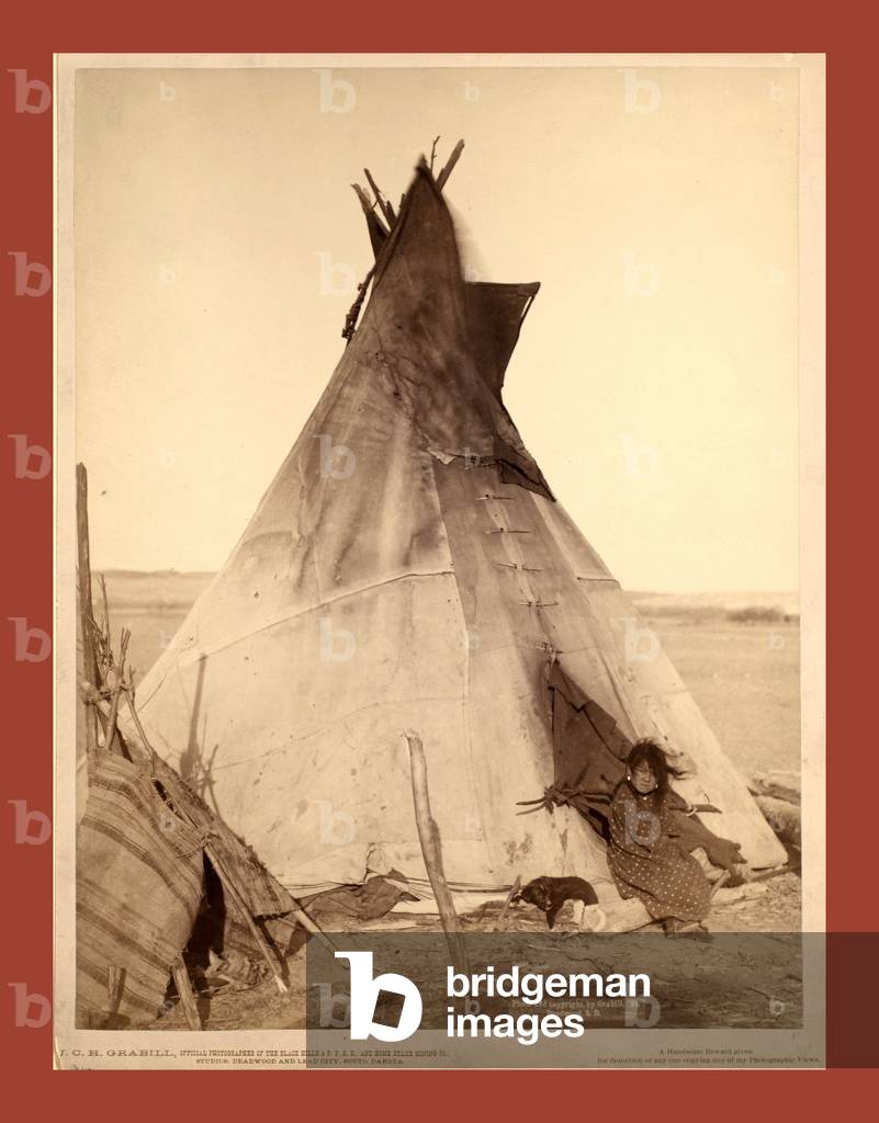 A Young Oglala Girl Sitting in Front of a Tipi, with a Puppy Beside Her, Probably on or Near Pine Ridge Reservation