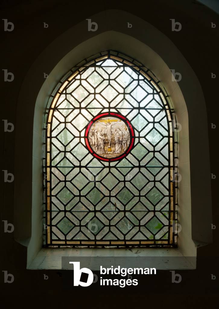 Former monastery (Zwartzusterklooster). The cloister. A stained glass window. Scene of Our Lady of Sorrows. The Crucifixion of Jesus on Mount Calvary.