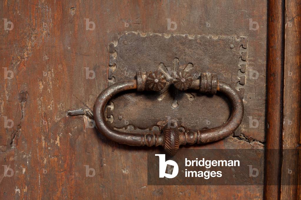 Cathedral. The cloister. A door. Door lock.