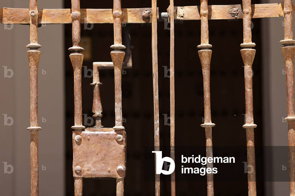 A house fence, doorlock.