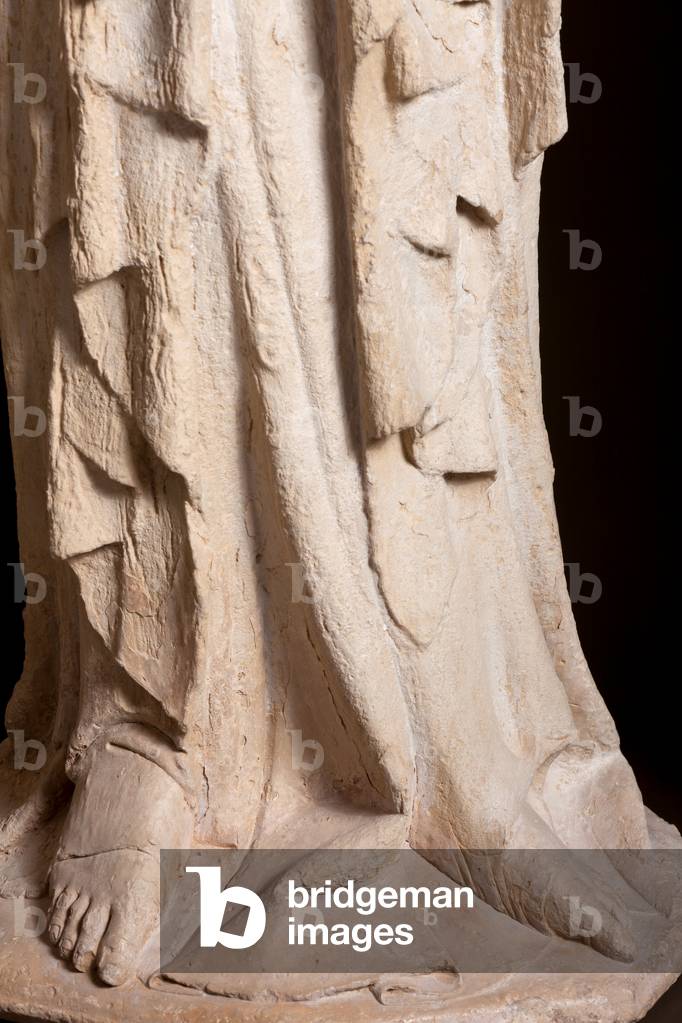 Museum Museu Comarcal de l'Urgell. Ensemble of five statues of apostles. Origin of the portal of the former church Santa Maria de Tàrrega portal. Detail. An apostle, bottom. 1319. Museum ref MCUT 2808,.