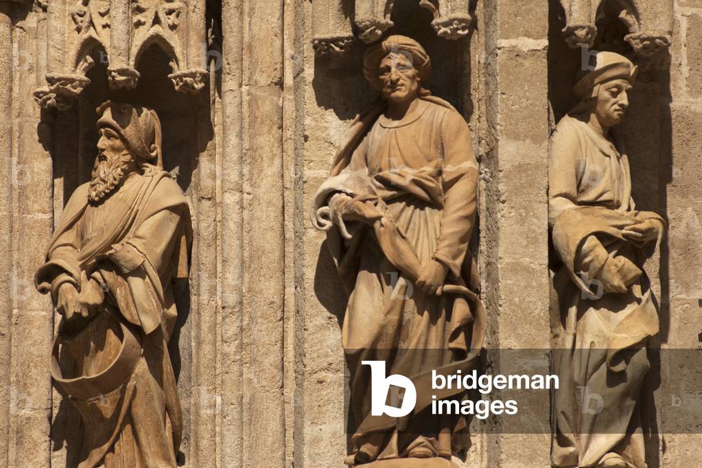The cathedral. Exterior. East. Portal (Puerta de las Campanilas). Detail. Right doorjamb. The statues.