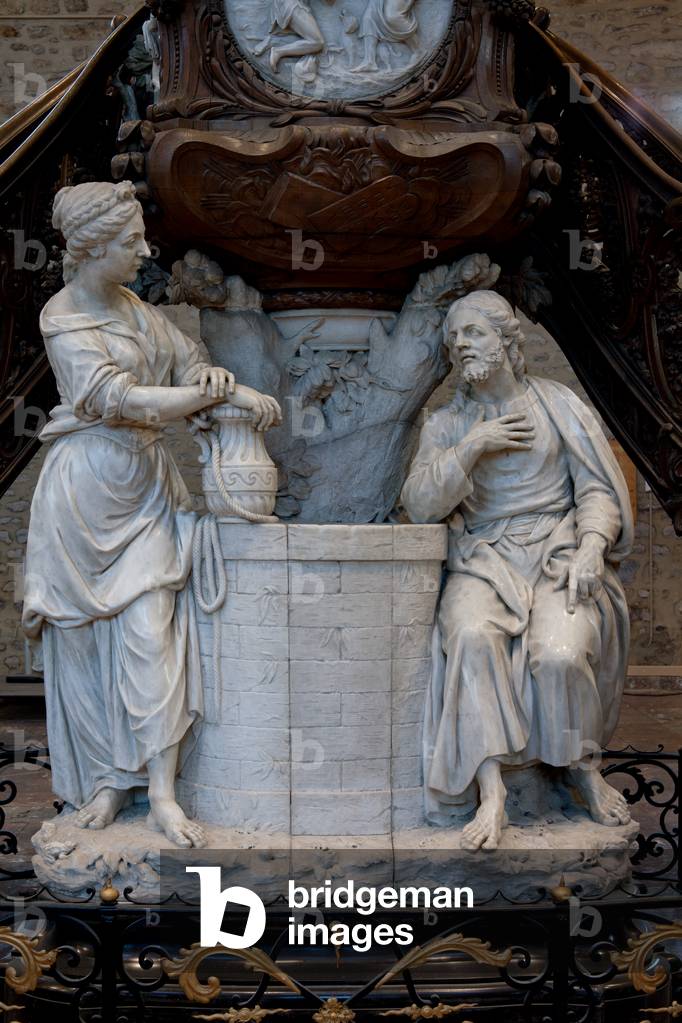 Collegiate church. Interior. Pulpit. Laurent Delvaux (1696-1778). Marble and wood. Baroque. Detail. Central group samaritan women at the water well of Jacob. White marble.
