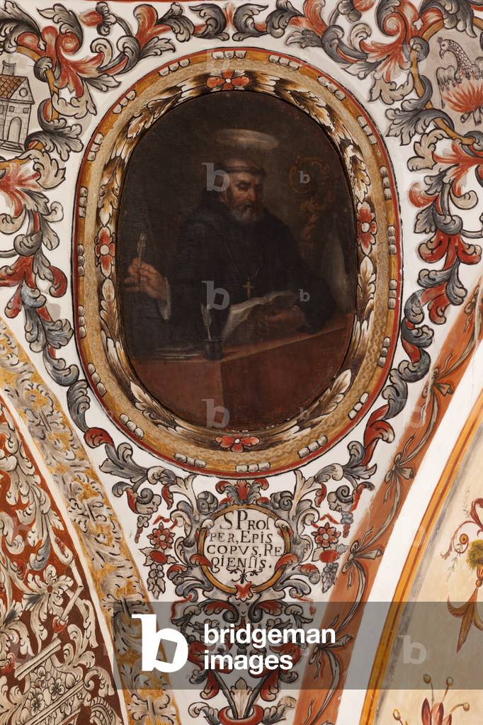 Parish church (Iglesia de San Agustín). Interior. The crossing. Detail. Wall paintings. Portrait of a saint. Text: S Pros PER EPIS COPVS RE GIENSIS. Baroque. 17th century.