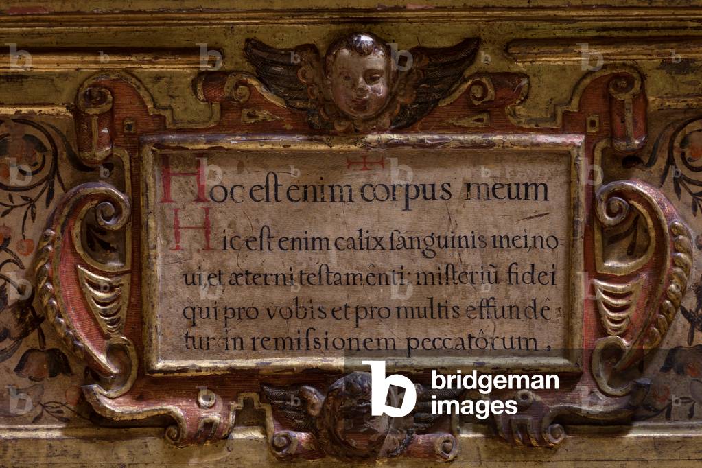 Collegiate church. Interior. North aisle. Altar (San Jose). Consecration text. Polychrome on wood. Before 1638.