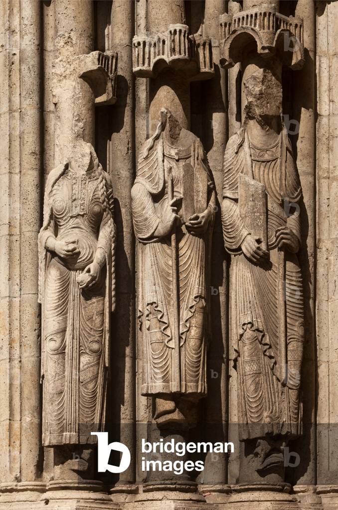 Collegiate church (Collégiale Notre-Dame-du-Fort). Exterior. South portal. Left doorjamb. Statues. 1130.