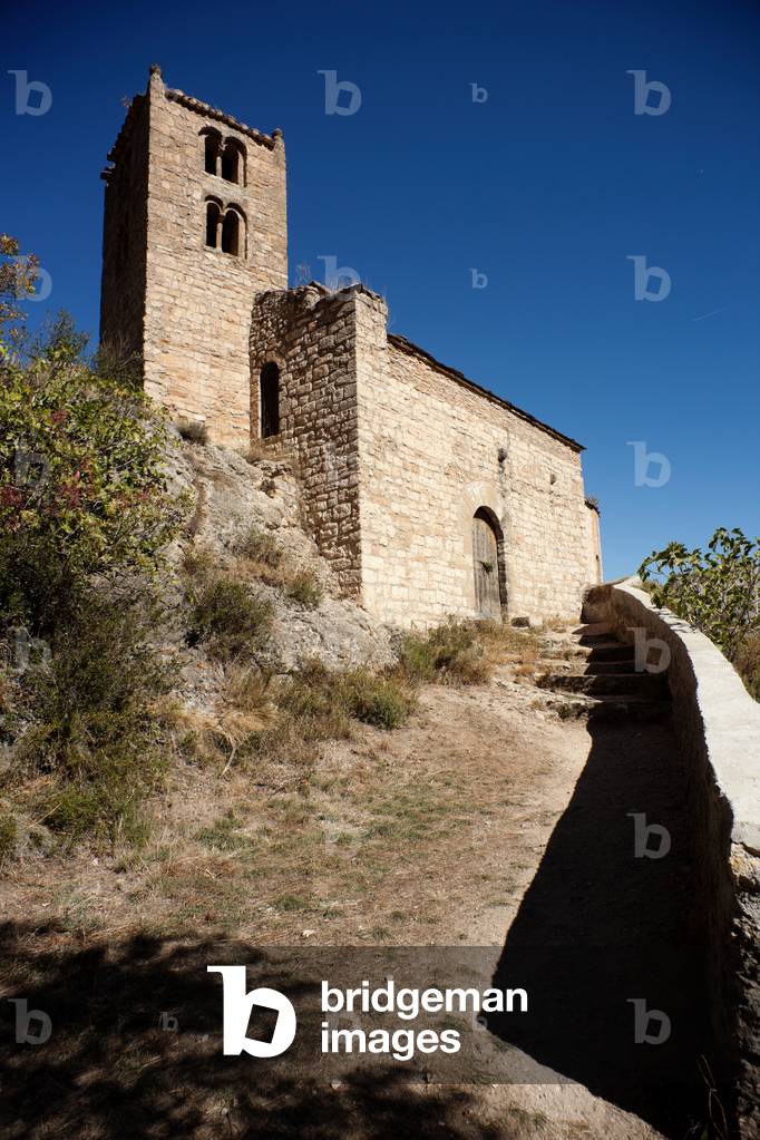 Castell-llebre. Church (Església de Mare de Déu). The church. South façade. The tower. Romanesque.