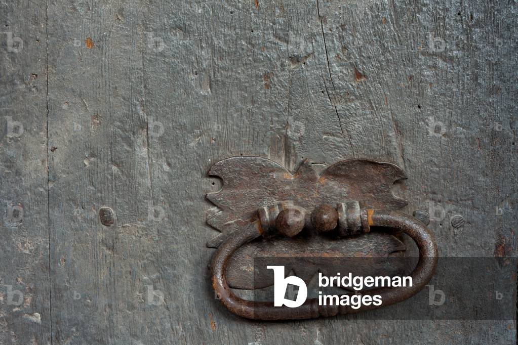 Cathedral. The cloister. A door. Door lock.
