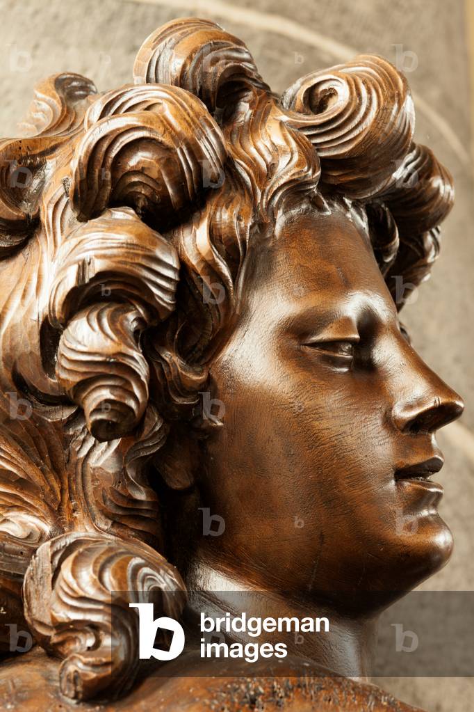 Parish church (Sint-Pieterskerk). Interior. Statue of an angel. Varnished wood.