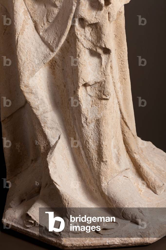Museum Museu Comarcal de l'Urgell. Ensemble of five statues of apostles. Origin of the portal of the former church Santa Maria de Tàrrega portal. Detail. An apostle, bottom. 1319. Museum ref MCUT 2808,.