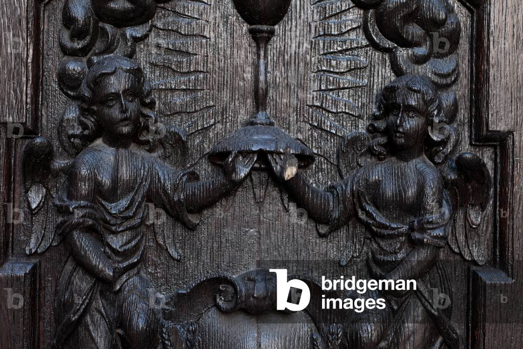 Parish church (Sint-Stefanuskerk, (Kerk Paters Augustijnen). Exterior. Entrance porch. Baroque. Detail of the door.