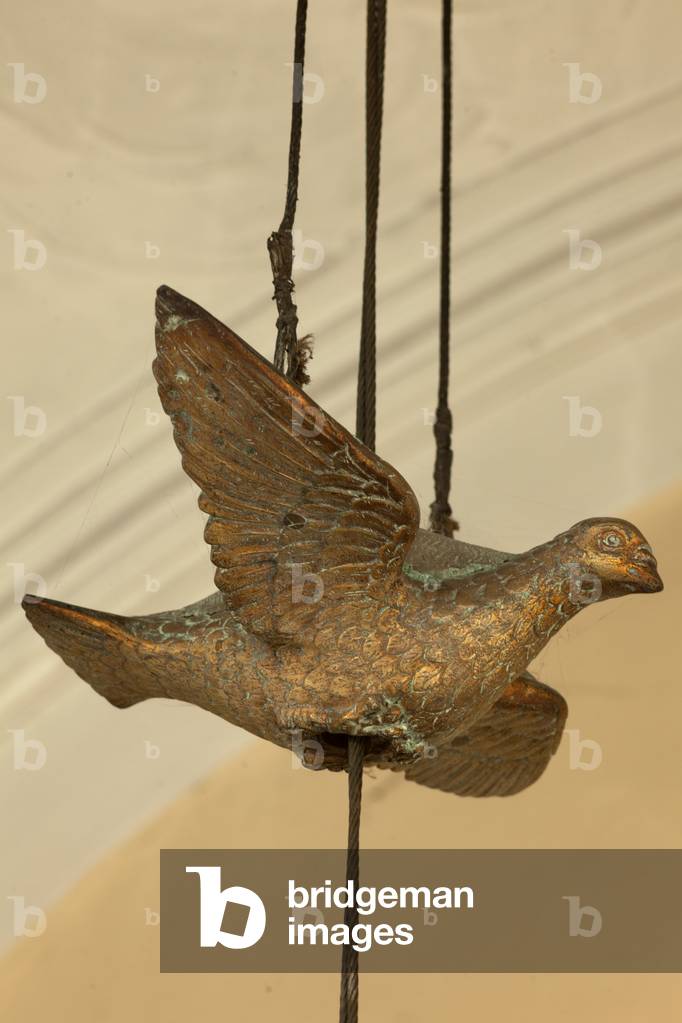 Parish church (Sint-Pieterskerk). Interior. The baptismal font. Detail. The cover lift mechnism with a pigeon (Holy Spirit).
