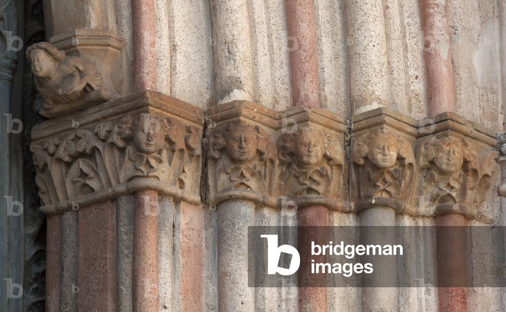 The basilical church. Exterior. Façade. Left entrance porch. The capitals of the door jamb.
