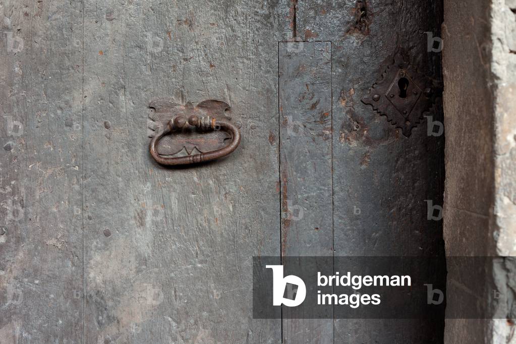 Cathedral. The cloister. A door. Door lock.