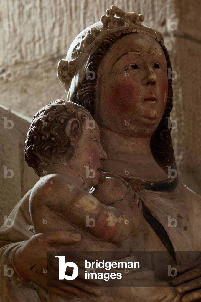Parish church (Església Santa Maria del Castell de Cubells). Interior. Statue. Madonna with child. Detail bust. Romanesque.