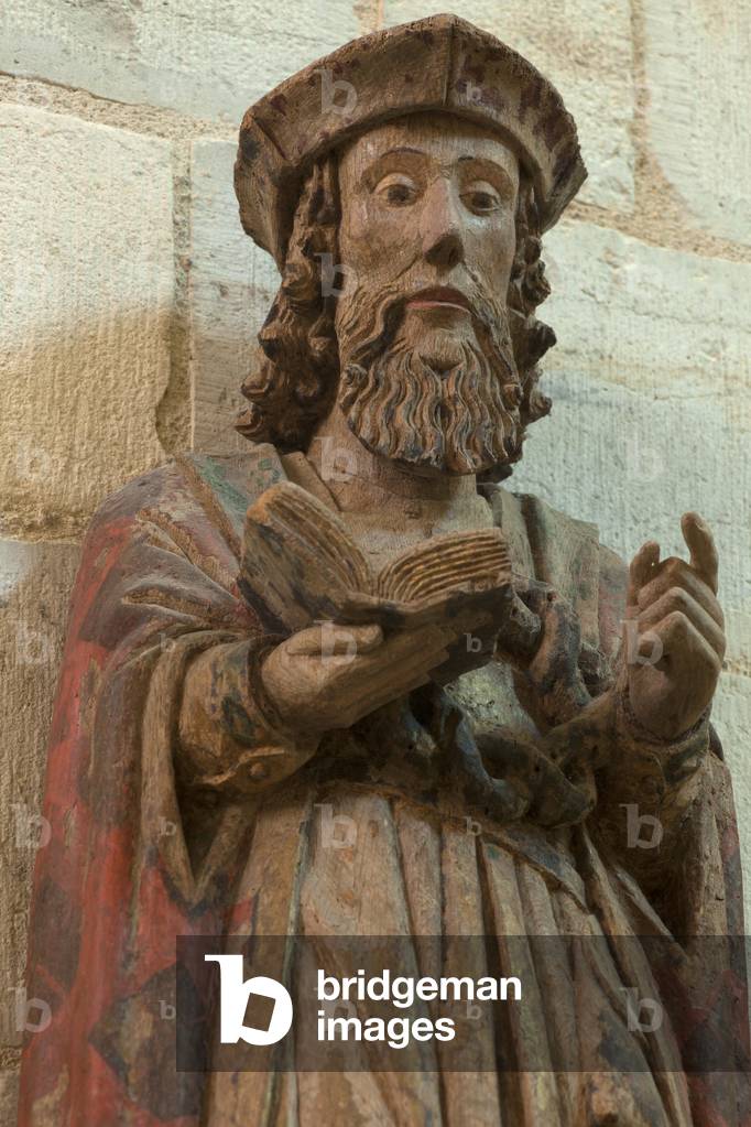 Basilic church (Basilique Saint-Jacques-le-Majeur, Collégiale Saint-Etienne). Interior. A statue. A pilgrim (Pèlerin méditant sur la passion du Christ). Detail. Bust. Wood. Rests of polychrome. Begin 14th century.