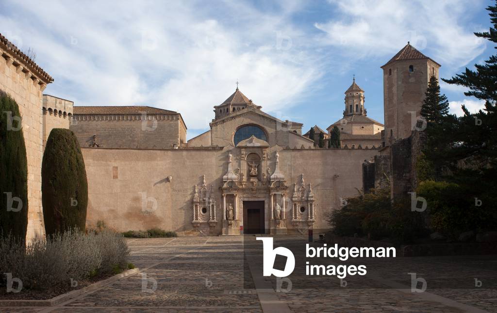 Monastery (Monestir de Poblet). The main square (Plaça Major). The church façade.