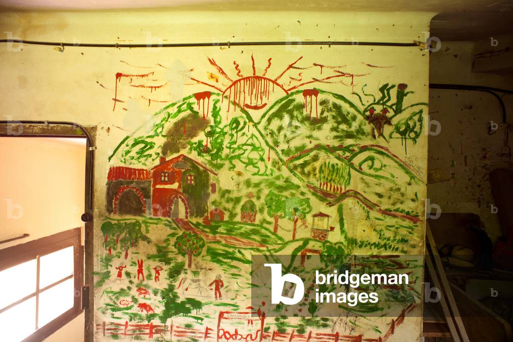 Former hotel (Hostal Vell - la Toranesa). Interior. Accces to the he cinema projection room. Wall paintings.
