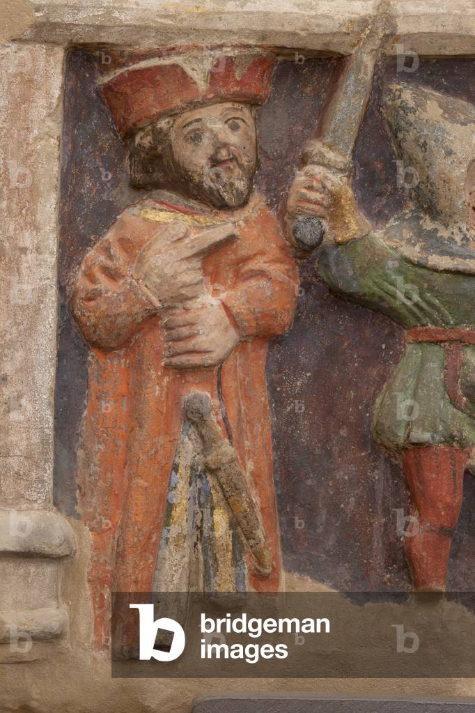 Altarpiece. polychrome stone. Second half 14th century. Origin former parish church of Torre de Rialb. Detail. Mid register. Left panel. Lower part: an official is looking at the scene at the beheading of Saint Iscle and the amputation of the breasts of Saint Victoria.