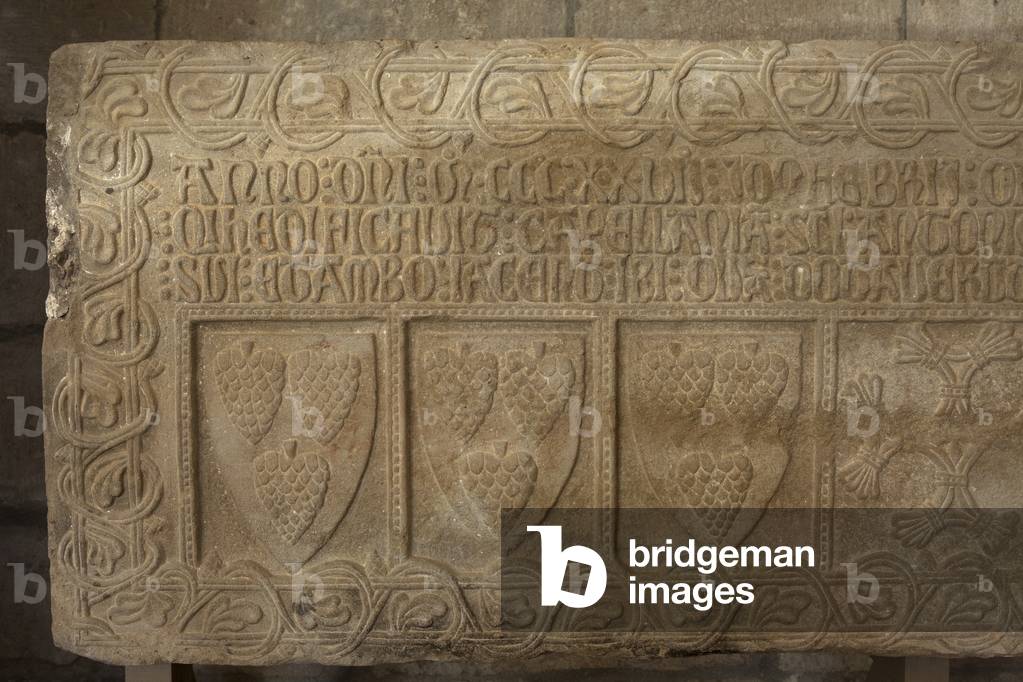 Pinell. The church. Interior. A sarcophagus. Detail. Escutcheons.