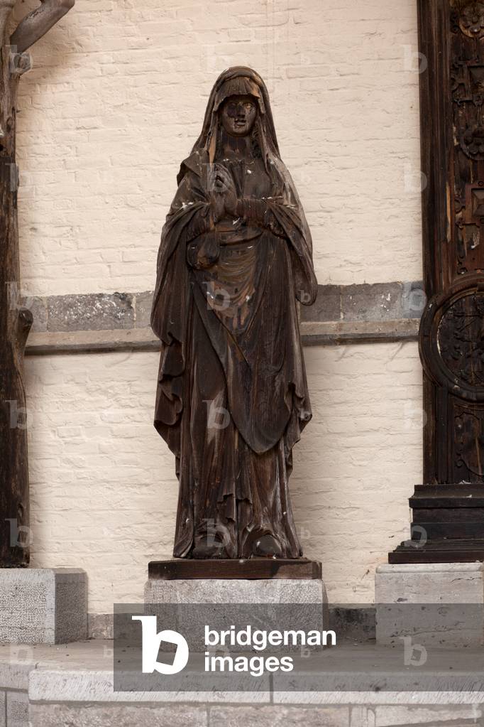 Church (Eglise Saint-Martin). Exterior. A Calvary. 16th century.